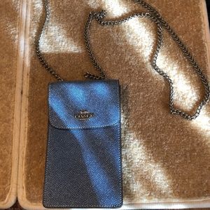 COACH Blue and silver cell phone purse. Holds credit cards on back. Like NEW